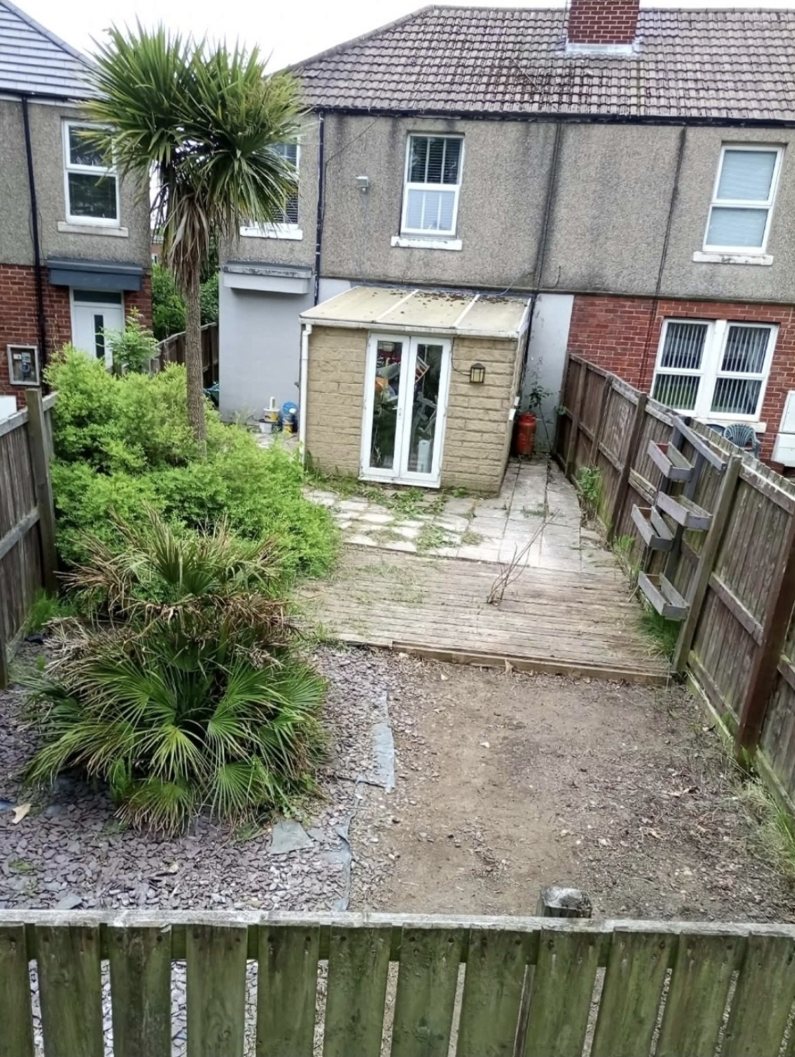 After: the same outdoor area cleared and tidy